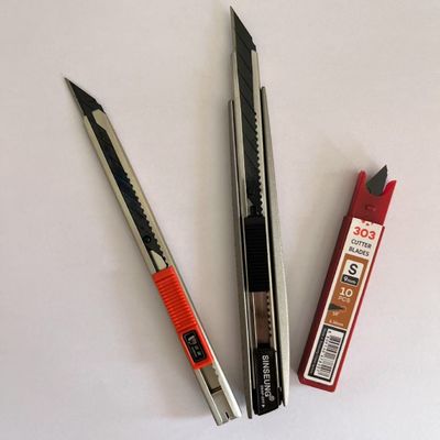 comprar 0.38mm espesor 9mm cuchillas de corte hechas de acero de alto carbono SK2 para el corte de trabajo pesado Fabricación en línea