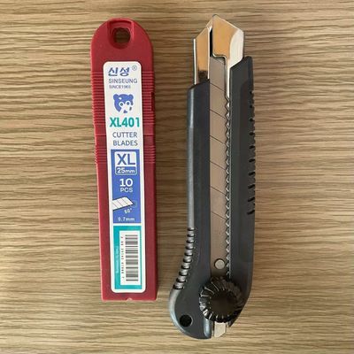 Cuchillo utilitario de plástico ABS con hojas SK2 para tablero de yeso y corte de hierro
