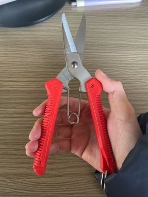 Tijeras multiusos de ferretería de 200 mm con mango naranja
